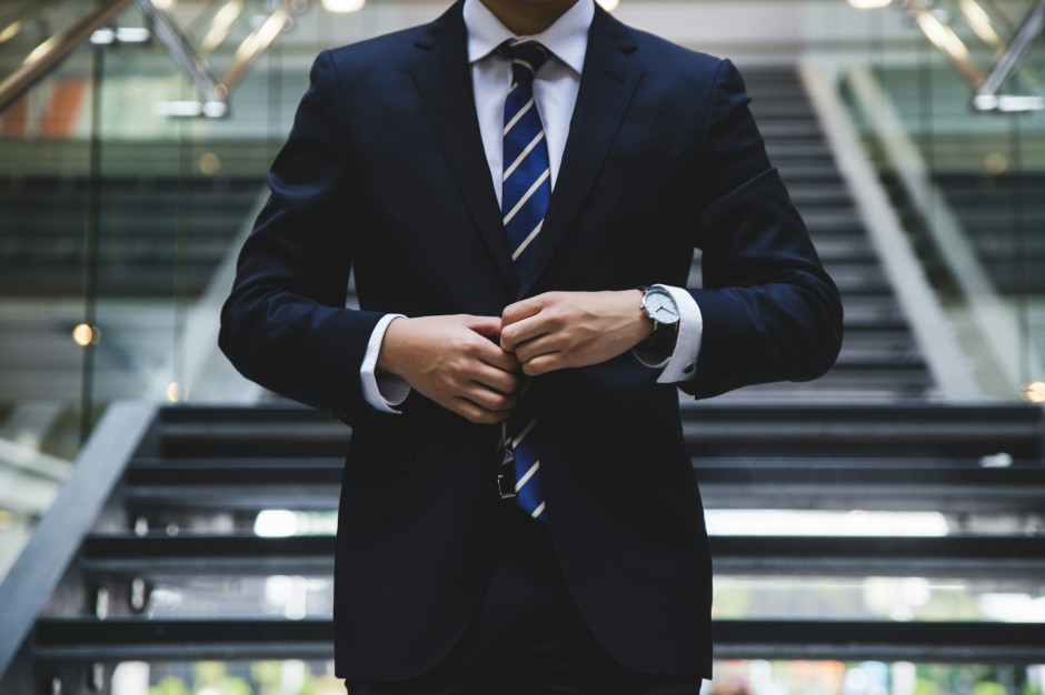 Businessman, man in suit/ Unsplash, Hunters Race