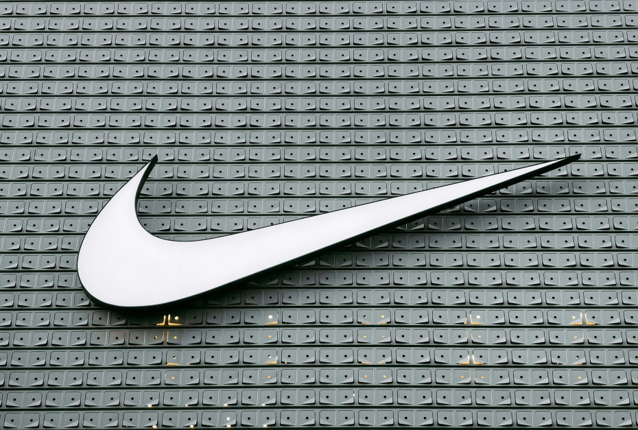 Nike logo on a building / Unsplash, Wu Yi