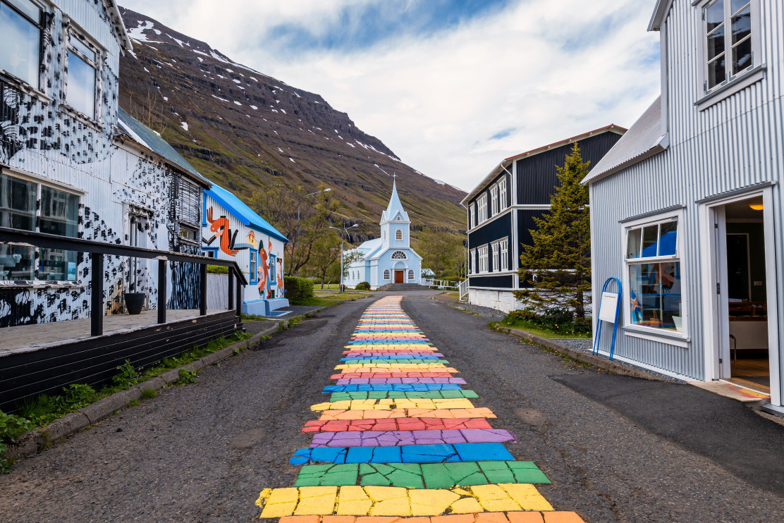 Rainbow Street in Seyðisfjörður, Iceland / Shutterstock / True Pixel Art